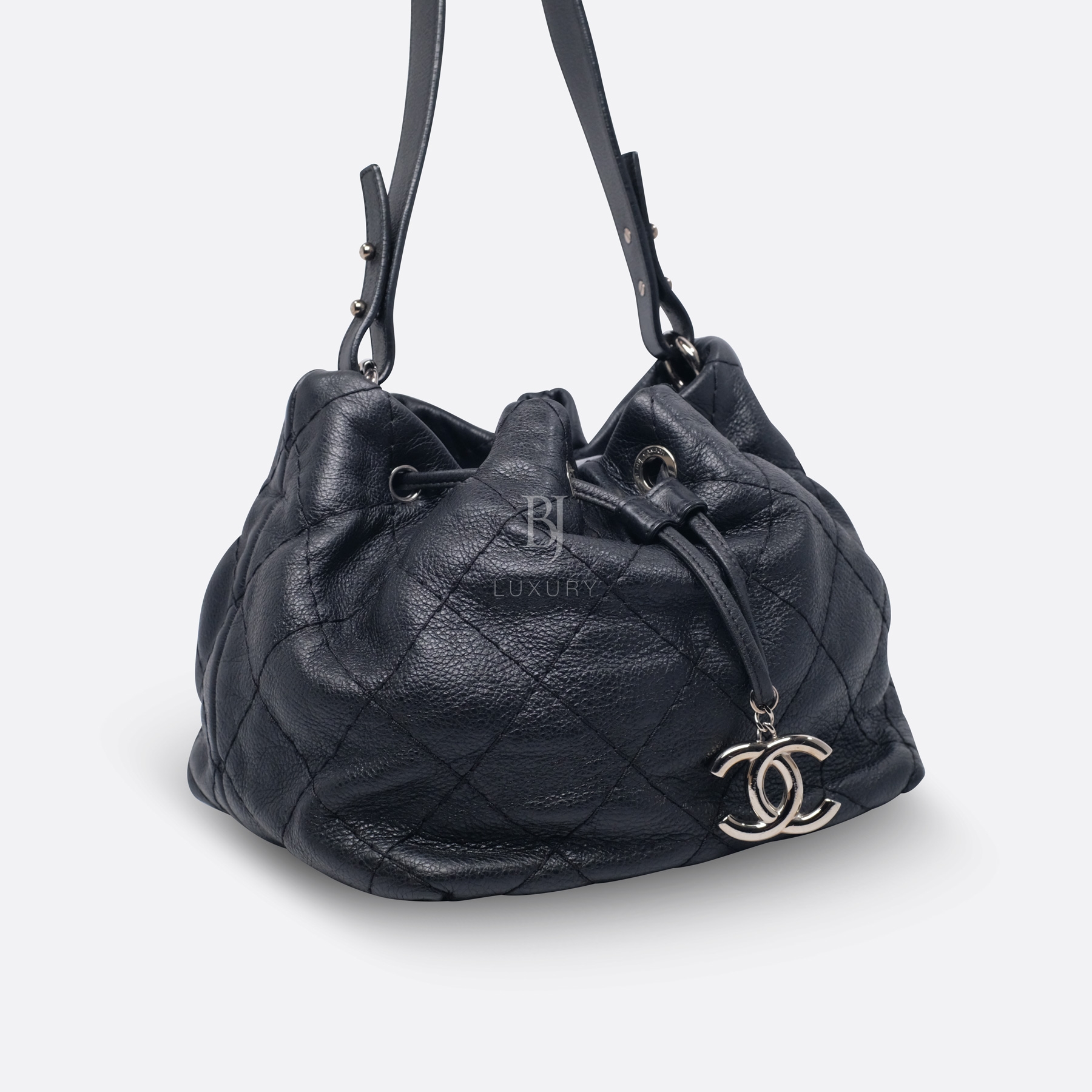 CHANEL BUCKET BAG 24 BLACK AGED CALFSKIN