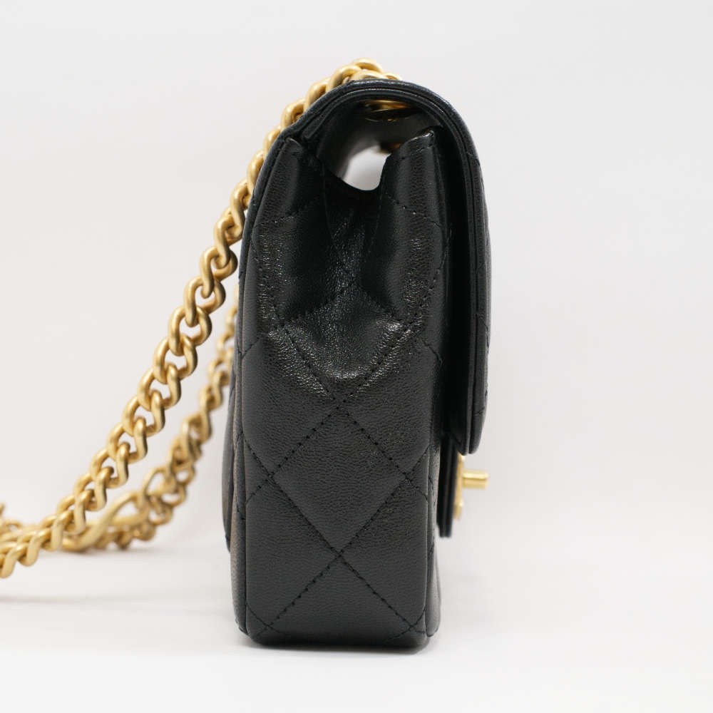 CHANEL-FLAPBAG-SMALL-BLACK-CAVIAR-5359 side1.jpg