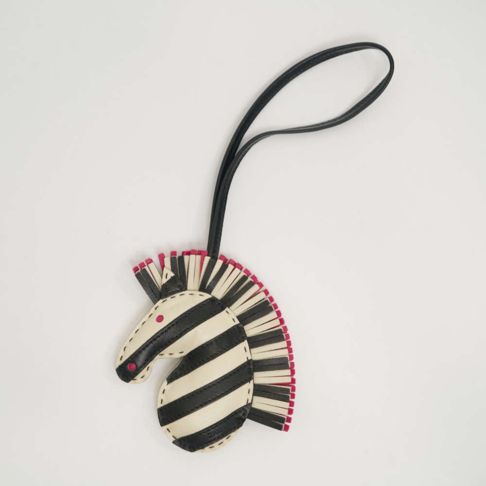 HERMES-GEEGEESAVANNAHCHARM-CRAIE-MILO-7877 back.jpg