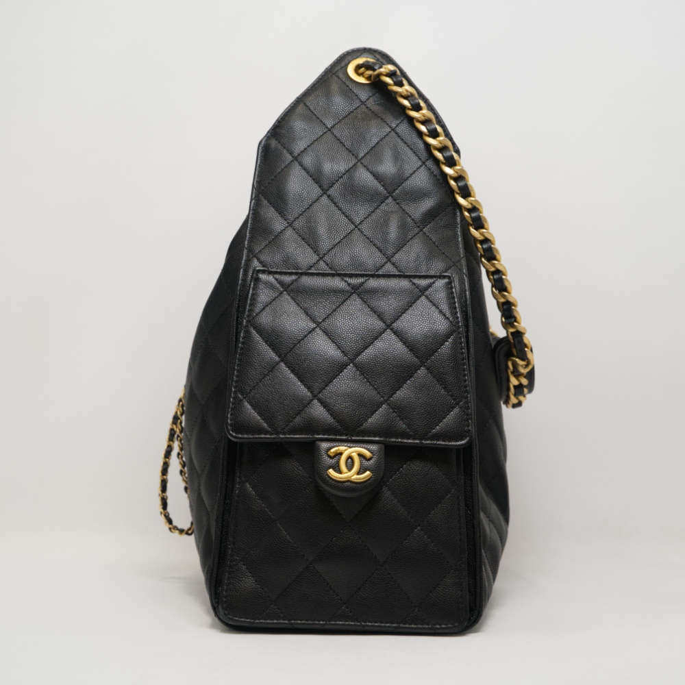CHANEL-CHANEL25-MEDIUM-BLACK-CAVIAR-8451 side.jpg